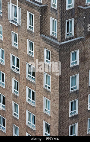 Exterior of modern office building in red bricks with white finish. Stock Photo