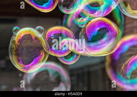 Bubbles from a street entertainer on the South Bank London Stock Photo