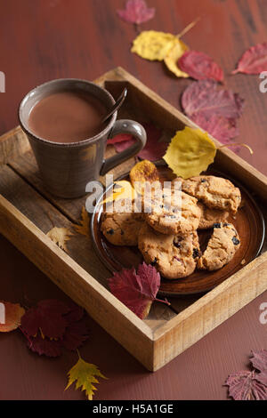 hot chocolate warming drink cozy autumn leaves cookies Stock Photo