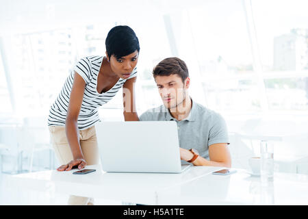 Group of two young business people working in team in office Stock Photo
