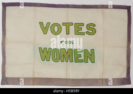 A banner promoting women's suffrage, likely from the early 20th century ...