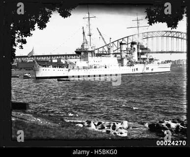 USS ASTORIA at anchor in Farm Cove, Sydney Stock Photo