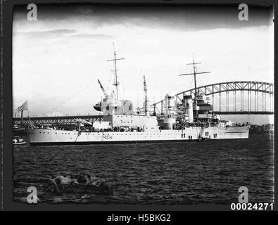 USS ASTORIA at anchor in Farm Cove, Sydney Stock Photo