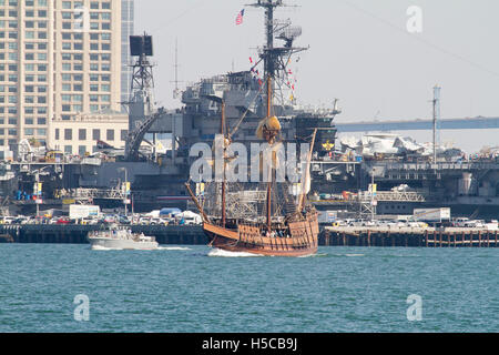 Tall ship San Salvador with USS Midway in background during 2016 Festival of Sail, Parade of Ships, San Diego Bay, CA Stock Photo
