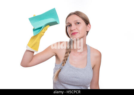 Young woman cleaning with rag, isolated on white background Stock Photo