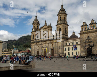 Bogota, Colombia - May 01, 2016:  Pigeons and tourists on Bolivar Square in Bogota Stock Photo