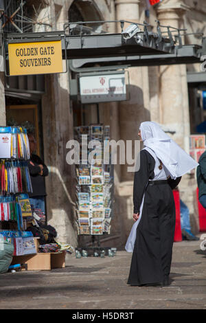 A nun in the Christian Quarter of the Old City of Jerusalem. Israel. Stock Photo