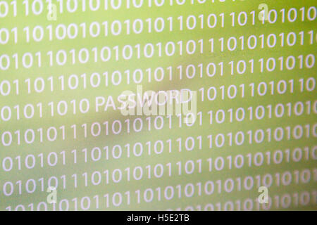 White numbers zero and one as a texture, password text on a white, yellow gradient background, laptop computer monitor Stock Photo