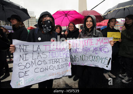 Buenos Aires, Buenos Aires, Argentina. 19th Oct, 2016. Gathering under the slogan Ni Una Menos ('Not one less'') and spurred by the brutal murder of 16-year-old LucÃa Pérez in Mar del Plata last week, hundreds of thousands of women across Argentina yesterday protested against gender violence and femicide in mass rallies across many cities, including Buenos Aires City, where demonstrators shrugged off heavy rain to march dressed in black from the Obelisk to the Plaza de Mayo. © Claudio Santisteban/ZUMA Wire/Alamy Live News Stock Photo