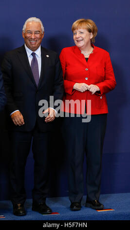 Brussels, Belgium. 20th Oct, 2016. German Chancellor Angela Merkel (R) talks with Portuguese Prime Minister Antonio Costa at a group photo session during an EU Summit at its headquarters in Brussels, Belgium, Oct. 20, 2016. © Ye Pingfan/Xinhua/Alamy Live News Stock Photo