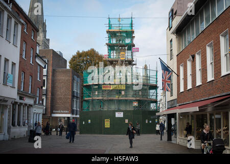 The Market Cross in Chichester, West Sussex, England is covered in scaffolding as repairs are made to the monument which dates back to 1501. Stock Photo