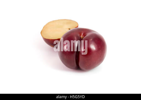 Prunes Plum fruit isolated on white Stock Photo