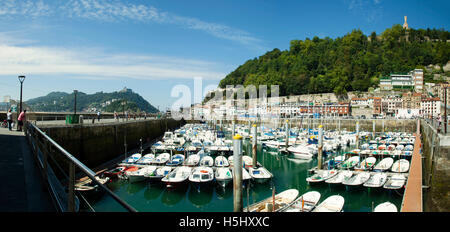 Panoramic of San Sebastian, Old Town Harbour, Boats in the small harbour next to the Old Town in San Sebastian, Spain. Stock Photo