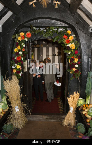UK, England, Cheshire, Siddington, All Saints Church, Harvest festival, porch decorated with fruit and vegetables Stock Photo