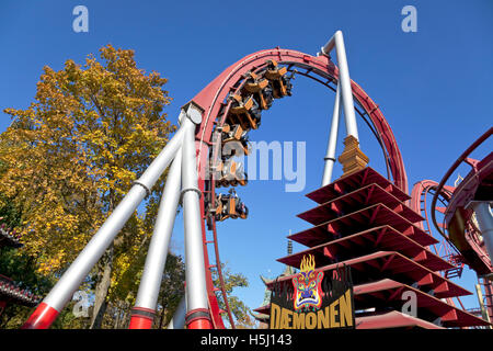 Dæmonen, the Demon ride, in the Tivoli Gardens in Copenhagen on a sunny late October day during the Halloween theme season. Stock Photo