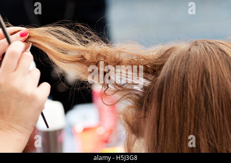 Female Client Having a Blow Dry in a Hairdressing Salon Stock Photo