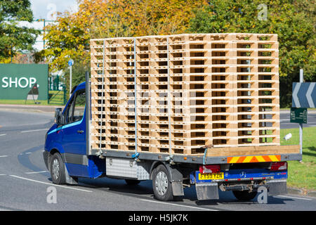 Wooden pallets being transported on a van. Stock Photo