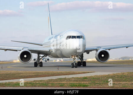 Borispol, Ukraine - October 23, 2011: Boeing 767 is taxiing along the runway in the airport - front view Stock Photo