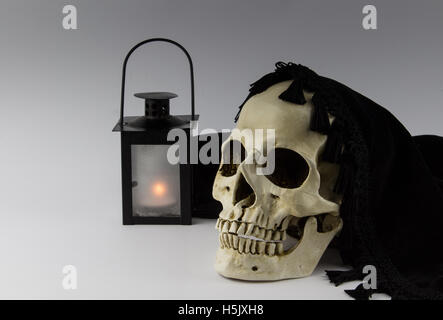 Skull and lantern isolated on grey background Stock Photo