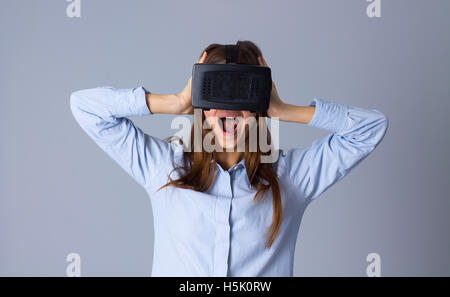Woman using VR glasses Stock Photo