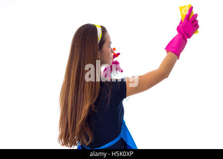 Woman using detergent and duster Stock Photo