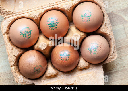 A box of six Clarence Court stamped free-range brown eggs. Stock Photo