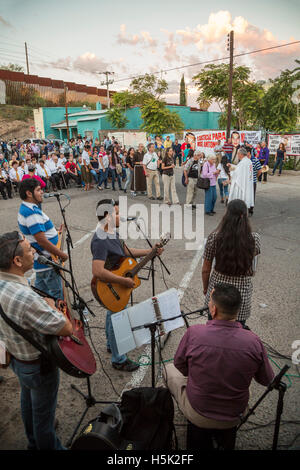 Nogales Mexico - Catholic mass at site where 16-year-old boy was shot through the border fence by the U.S. Border Patrol. Stock Photo