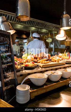 Food station with grilled carving food with kitchen working background Stock Photo