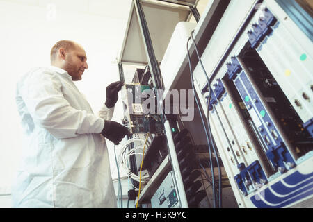 Technician working in network card labaratory Stock Photo