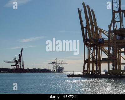 IDLE CONTAINER HANDLING GANTRY LIFTING CRANES PORT VELL BARCELONA SPAIN Stock Photo