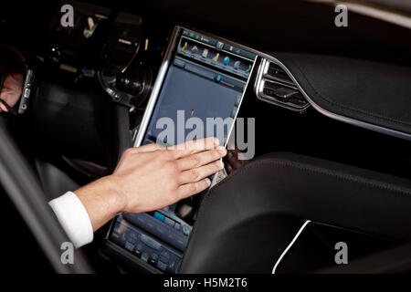 Using navigation system in car Stock Photo