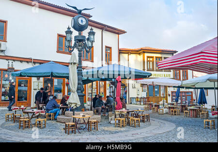 The cozy outdoor teahouse in the city center, where  locals like to spend their time, drinking tea, coffee and smoking Stock Photo