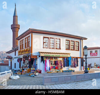 The  scenic cottage of the modern neighborhood in old town with the wooden minaret on the background Stock Photo