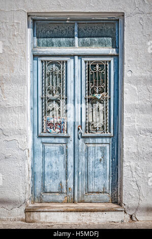 Front entrance to an abandoned proberty on the Greek island of Crete. Stock Photo