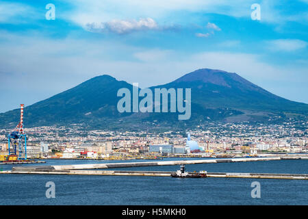 Mount Vesuvius looms over the city of Naples in Italy. Stock Photo