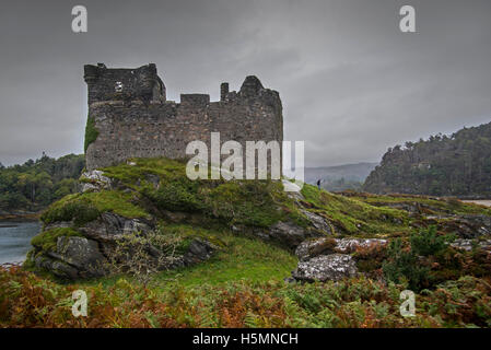 Castle Tioram on the tidal island Eilean Tioram in Loch Moidart in autumn, Lochaber, Scottish Highlands, Scotland Stock Photo