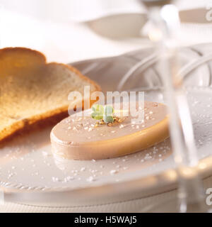 Fois gras de canard on a plate with bread Stock Photo