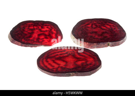 Fresh slices red beet root isolated on white background. Food background and Three separate objects  with clipping paths Stock Photo