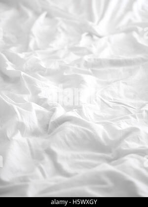 Soft white bed sheet background Stock Photo