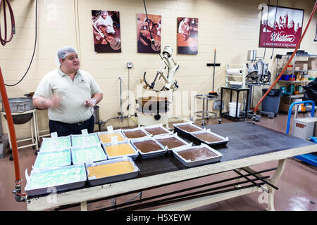 St. Saint Augustine Florida,Whetstone Chocolates,interior inside,factory,adult,adults,man men male,guide,working,work,worker,workers,servers employee Stock Photo