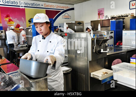 Students at work during a practical lesson at the Carpigiani gelato University in Anzola nell'Emilia, Italy Stock Photo