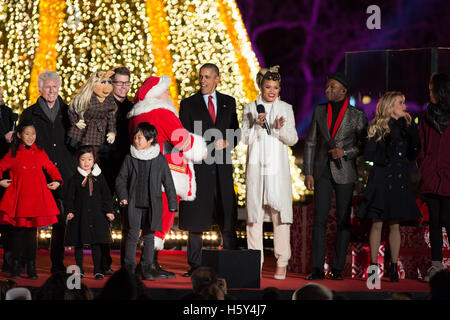 (L-R) Graham Nash, Miss Piggy, Santa Claus, U.S. President Barack Obama, Andra Day, Aloe Blacc and Reese Witherspoon on stage at the 2015 National Christmas Tree Lighting on December 3rd, 2015 in Washington D.C. Stock Photo