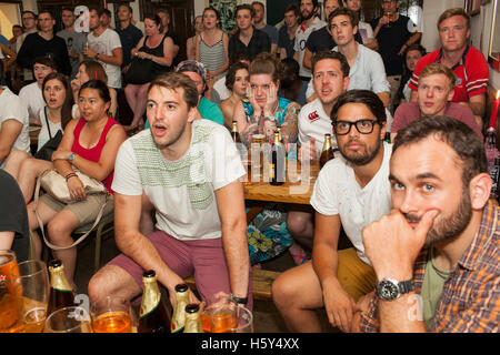 England rugby fans watch a world cup warm up game against France in the Faltering Fullback pub in Finsbury Park, north London. Stock Photo