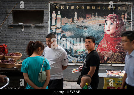 Muslim quarter of Xian, Shaanxi, China, Asia. Silk road, Huimin Street, Beiyuanmen Moslem market. Alleys with many food shops in Stock Photo