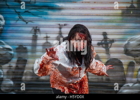Horror portrait bloodstained soaked night art; Southport, Merseyside, UK, October, 2016. Happy Halloween at Pleasureland, Spookport, Southport’s unique Festival 2016, with spookier, ghoulish goings on than ever before.  Strange, ghostly and spine tingling events have been going on for months in Pleasureland and the attractions continue to build on the approach to All Hallow's Eve as the spirits come out to play. Pleasureland hosts its annual Happy Halloween spectacular, a week packed full of brilliant, Halloween family fancy dress fun figures. Stock Photo