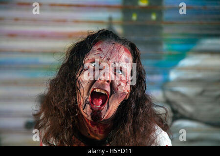 Horror portrait bloodstained soaked night art; Southport, Merseyside, UK, October, 2016. Happy Halloween at Pleasureland, Spookport, Southport’s unique Festival 2016, with spookier, ghoulish goings on than ever before.  Strange, ghostly and spine tingling events have been going on for months in Pleasureland and the attractions continue to build on the approach to All Hallow's Eve as the spirits come out to play. Pleasureland hosts its annual Happy Halloween spectacular, a week packed full of brilliant, Halloween family fancy dress fun figures. Stock Photo