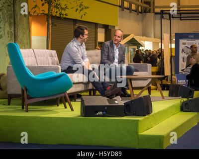 Birmingham, UK. 21st October, 2016. Kevin McCloud, presenter of Grand Designs, interviews architect Matt White in front of a live audience as part of the Grand Designs Live. The show offers visitors a unique opportunity to see all the latest trends for the home as well as many products never seen before. Based on the Channel 4 TV series, and presented by design guru Kevin McCloud, the event is packed with over 500 exhibitors and is open until 23rd October 2016. Photo Bailey-Cooper Photography/Alamy Live News Stock Photo