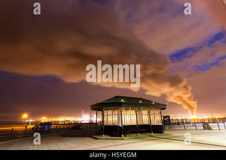 Large fire at Liverpool Docks in the early hours viewed from across the Mersey River at New Brighton Stock Photo
