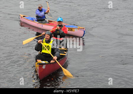 Dunkeld, Scotland, UK. 22nd Oct, 2016. Canoeists at the start of the 2016 Tay Descent which starts in Dunkeld and finishes in Perth. Dunkeld Perthshire, UK. 22nd Oct, 2016. UK.   Credit:  Cameron Cormack/Alamy Live News Stock Photo