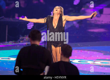 Dortmund, Germany. 21st Oct, 2016. Schlager singer Helene Fischer performing during the shooting of the TV show 'Schlagerboom - Das internationale Schlagerfest' at Westfalenhalle in Dortmund, Germany, 21 October 2016. The music TV show will be broadcasted on ARD on 22 October 2016. PHOTO: WOLFRAM KASTL/dpa/Alamy Live News Stock Photo